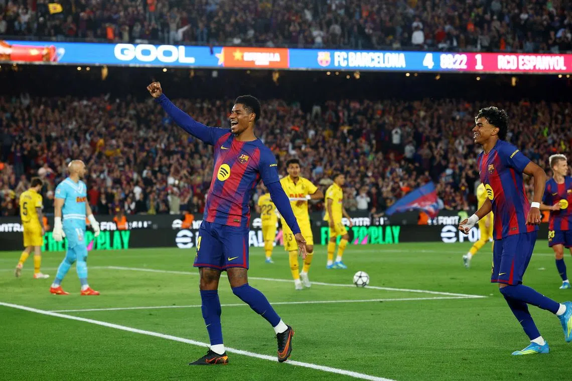 Soccer Football - LaLiga - FC Barcelona v Espanyol - Spotify Camp Nou, Barcelona, Spain - April 11, 2026 FC Barcelona's Marcus Rashford celebrates scoring their fourth goal with Lamine Yamal REUTERS/Albert Gea