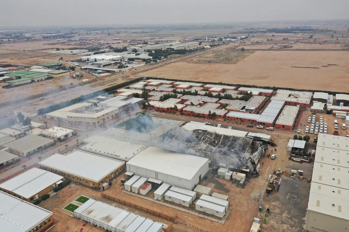 A drone view shows damage at storage facilities belonging to foreign oil companies, after what security sources said was a drone strike west of Basra, Iraq, April 4, 2026.