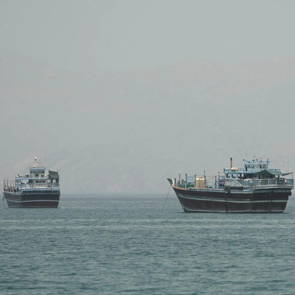 Vessels at the Strait of Hormuz, as seen from Musandam, Oman, on June 24.