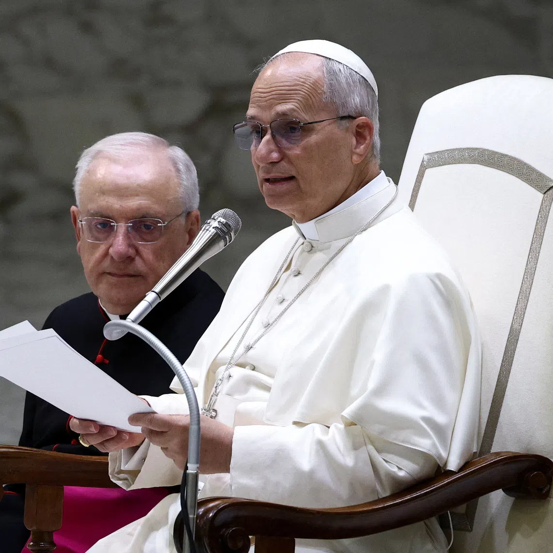 Pope Leo XIV speaks as he meets with members of the Equestrian Order of the Holy Sepulchre of Jerusalem at the Vatican, October 23, 2025. REUTERS/Guglielmo Mangiapane