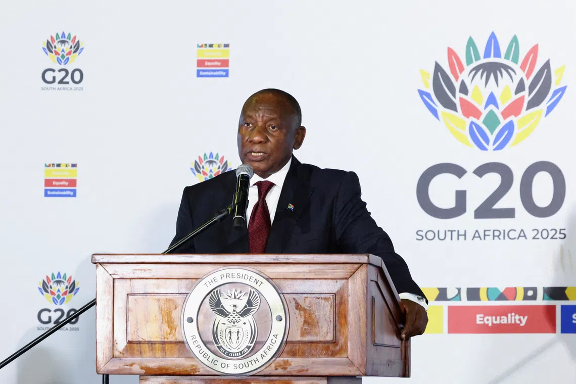 South Africa's President Cyril Ramaphosa speaks to members of the media on the sidelines of the meeting of the G20 foreign ministers, which is hosted by South Africa under the theme \"Solidarity, Equality and Sustainability\", at the NASREC conference centre in Johannesburg, South Africa, February 20, 2025. REUTERS/Siphiwe Sibeko