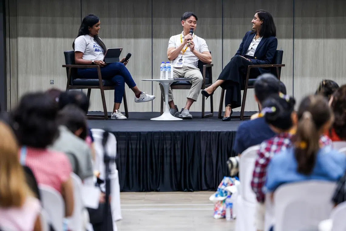 Discussing the challenges and progress of advancing animal welfare protection laws in Singapore are :Challenges and Progress with MP for the Nee Soon GRC Louis Ng (L) and Ms Sadhana Rai, Head of Representation, Pro Bono SG, SPCA Board Member (R), Moderated by Ms Aarthi Sankar, Executive Director, SPCA Singapore (in white), at the inaugural VOICE Conference held at Ngee Soon East CC on June 20th, 2024.