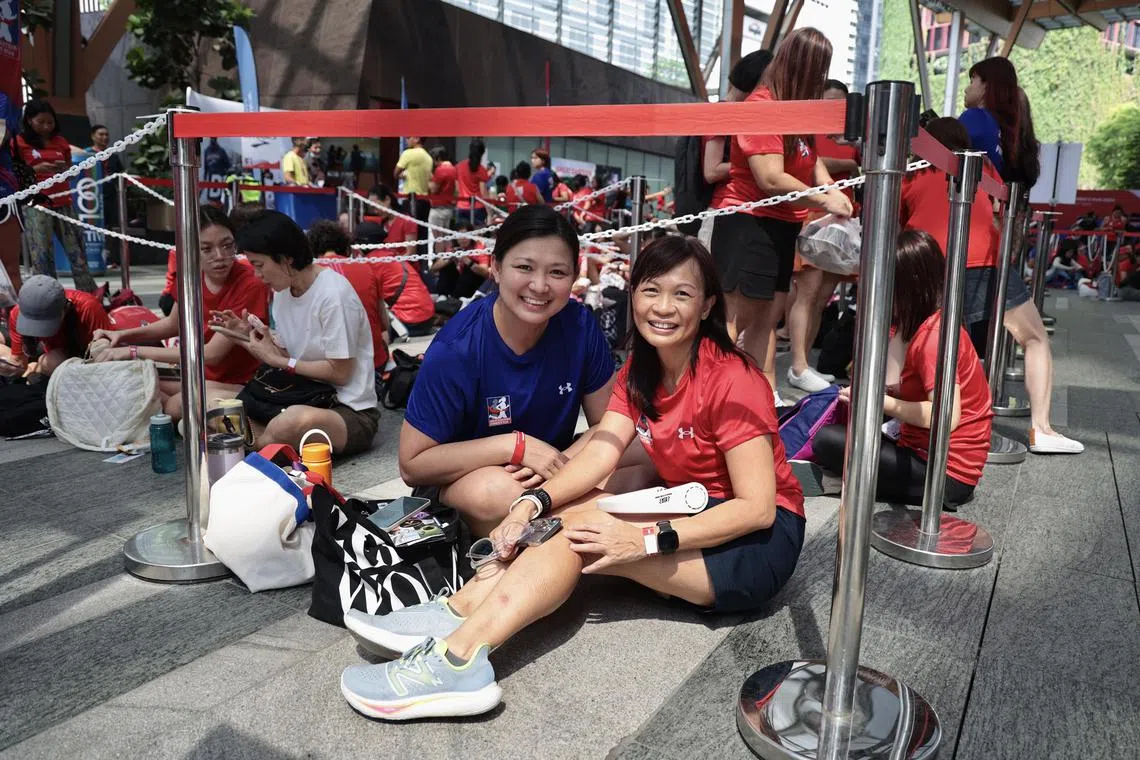 Debbie Wong (right) and her friend Su Fen were the first pair to start queueing at the launch event.