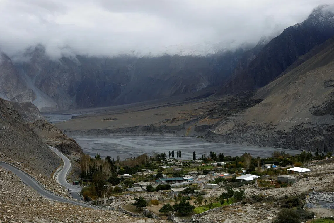 A view of Passu village, located in the Gojal valley in the Karakoram mountain range in the Gilgit-Baltistan region of Pakistan, Oct 8, 2023. Fifteen million people worldwide are at risk of glacial lake flooding, with 2 million of them in Pakistan, according to a February study published in scientific journal Nature Communications. 