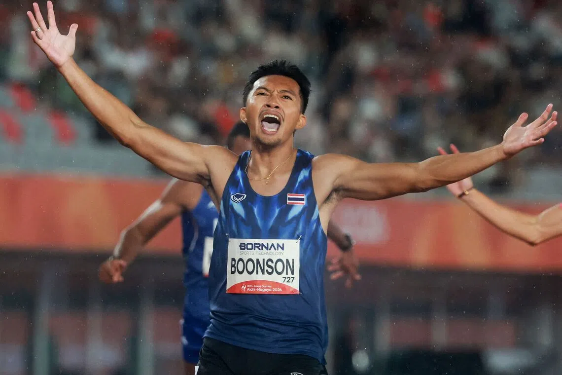 Thailand’s Puripol Boonson celebrates after winning the Asian Games men’s 200m final on Sept 27.