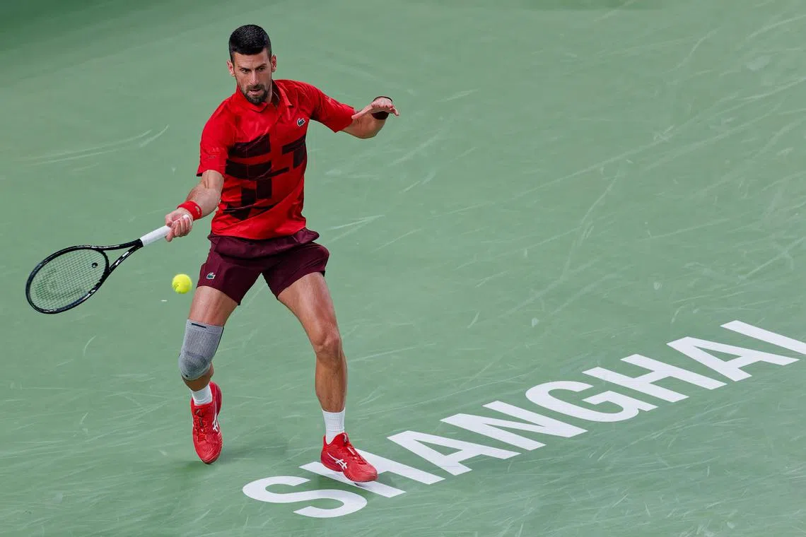 Novak Djokovic of Serbia in action during his 6-1, 6-2 round-of-32 win over Flavio Cobolli of Italy at the Shanghai Masters tennis tournament in China on Oct 8.