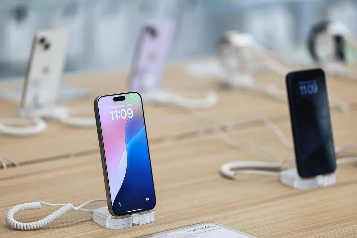 An Apple iPhone 16 Pro Max is displayed in a store ahead of the launch of sales of the new iPhone 16 series smartphones, in Moscow, Russia September 20, 2024. REUTERS/Evgenia Novozhenina
