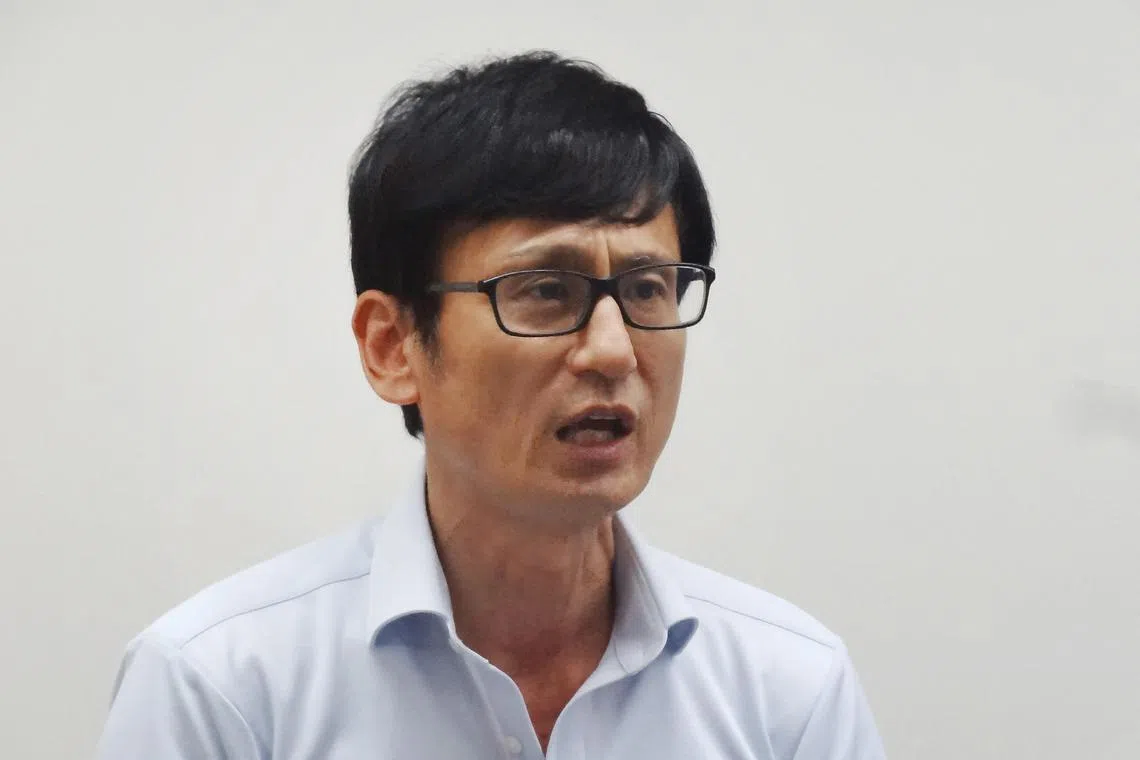 Japan Boxing Commission (JBC) secretary-general Tsuyoshi Yasukochi speaks during a press conference in Tokyo on Aug 12, 2025. 