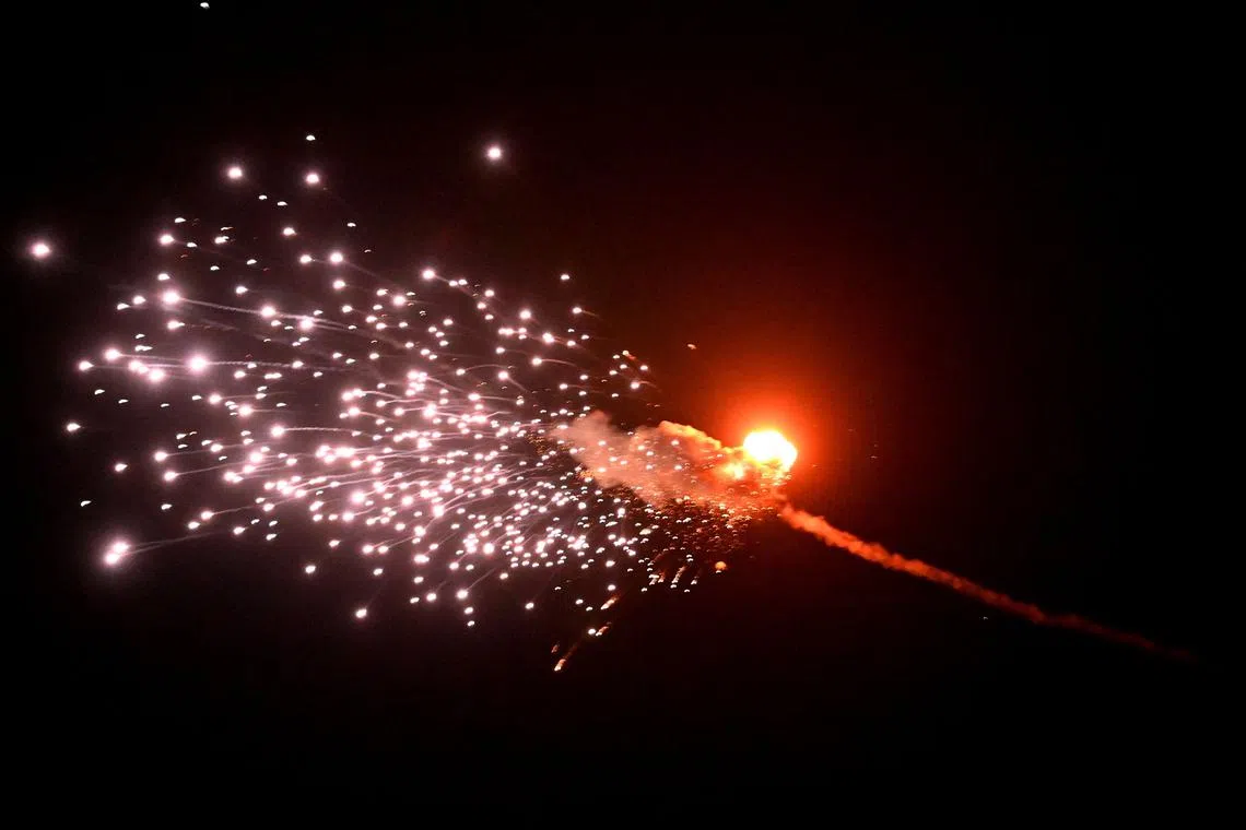 The explosion of a drone after it was shot down during a massive Russian drones strike in Kyiv, Ukraine, on May 28.