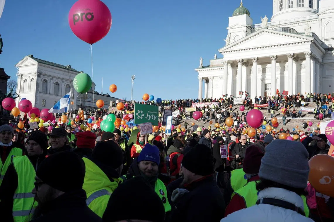 Protesters take part in a demonstration against Finland's government's planned labour market reforms and proposed cuts to the social welfare system at Senate Square in Helsinki, Finland, February 1, 2024. REUTERS/Essi Lehto/ File photo