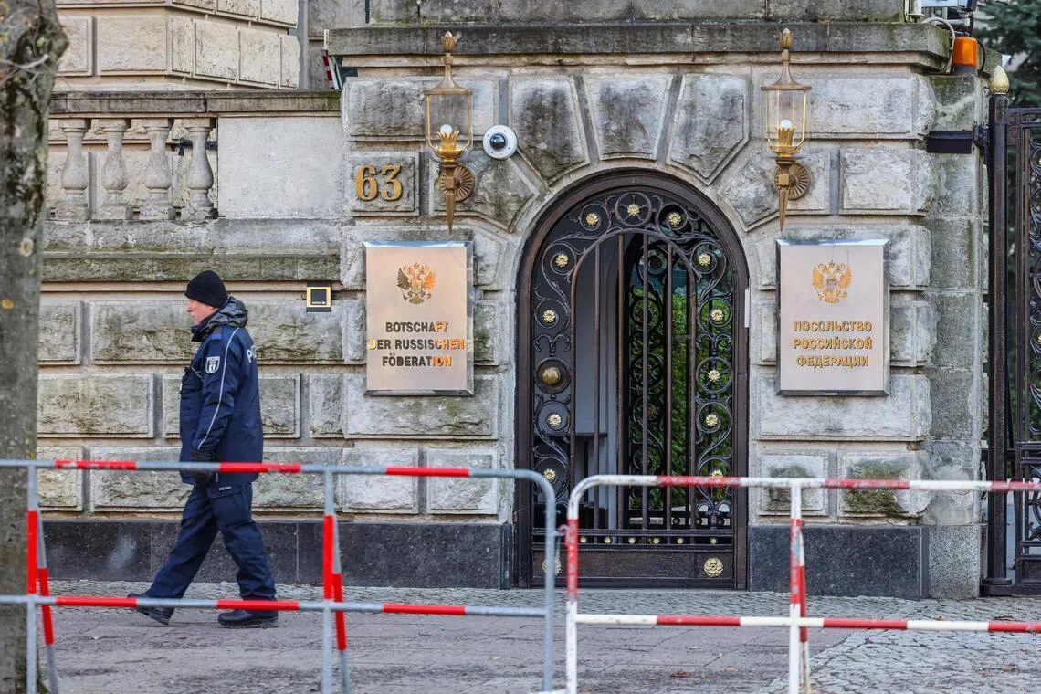 Germany summons Russia envoy, expels alleged spy handler