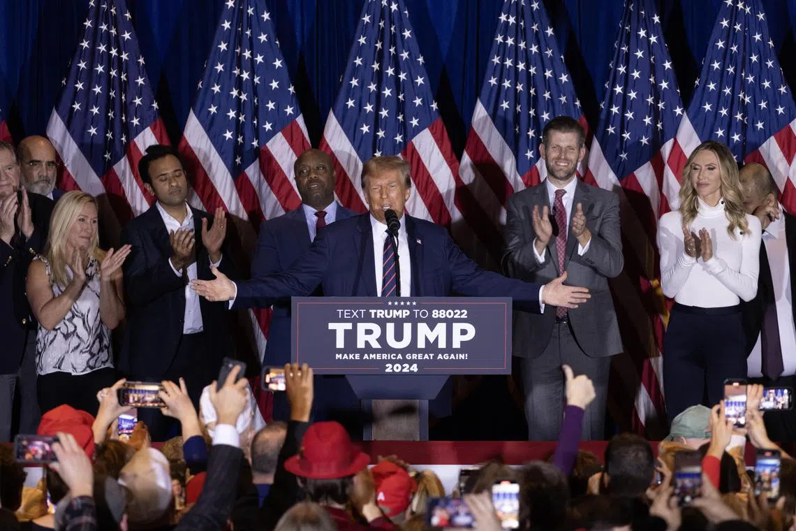 Former US president Donald Trump delivers a victory speech after winning the New Hampshire primary, in his bid for a second term.