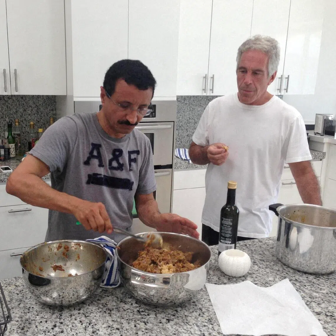 Former An undated photo provided by Democrats on the House Oversight committee, Sultan Ahmed bin Sulayem, left, head of the Dubai-based ports giant DP World, and Jeffrey Epstein. Bin Sulayem, often credited with turning DP World into a global logistics powerhouse, resigned on Feb. 13, 2026, the company said, amid mounting scrutiny of his ties to the convicted sex offender Jeffrey Epstein. (House Oversight Democrats via The New York Times) — NO SALES; FOR EDITORIAL USE ONLY WITH NYT STORY DUBAI EPSTEIN by LATIF DAHIR of FEB. 13, 2026. ALL OTHER USE PROHIBITED. —