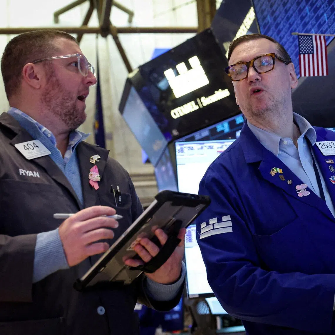 Traders working on the floor of the New York Stock Exchange, in New York City, on Feb 25.