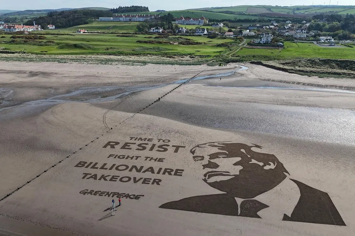 A drone view of artwork, produced by arts organisation \"Sand in Your Eye\" and Greenpeace, on the beach outside U.S. President Donald Trump's golf course in Turnberry, Scotland, Britain, April 30, 2025. Saf Suleyman/Greenpeace/Handout via REUTERS