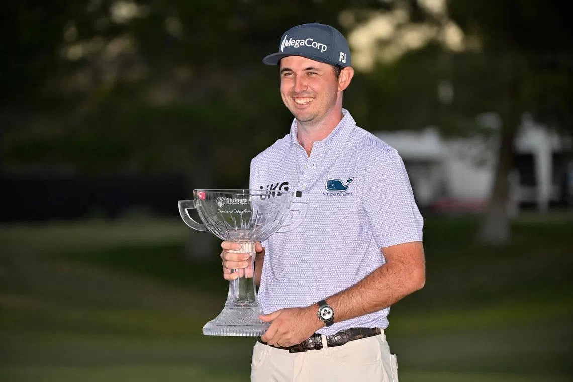 American golfer J.T. Poston with his trophy after Shriners Children's Open concluded at TPC Summerlin on Oct 20, 2024 in Las Vegas, Nevada.