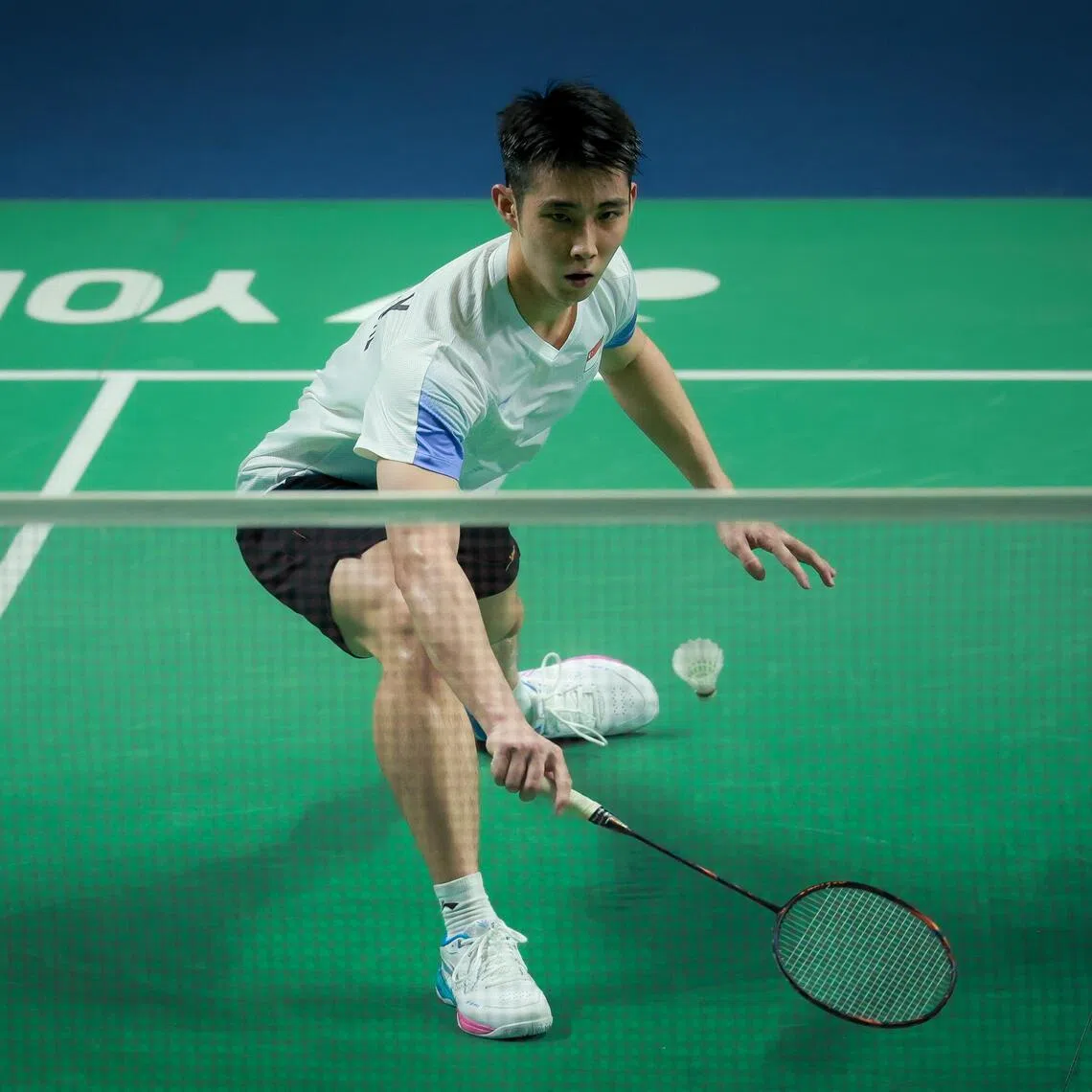 Singapore's Loh Kean Yew cruising past Xayyalath Souksavat of Laos 21-8, 21-11  in the men's team event on Dec 7. 