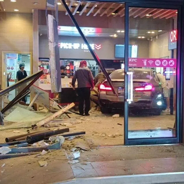 Glass panels were shattered, while tables, chairs and the counter area were badly wrecked.