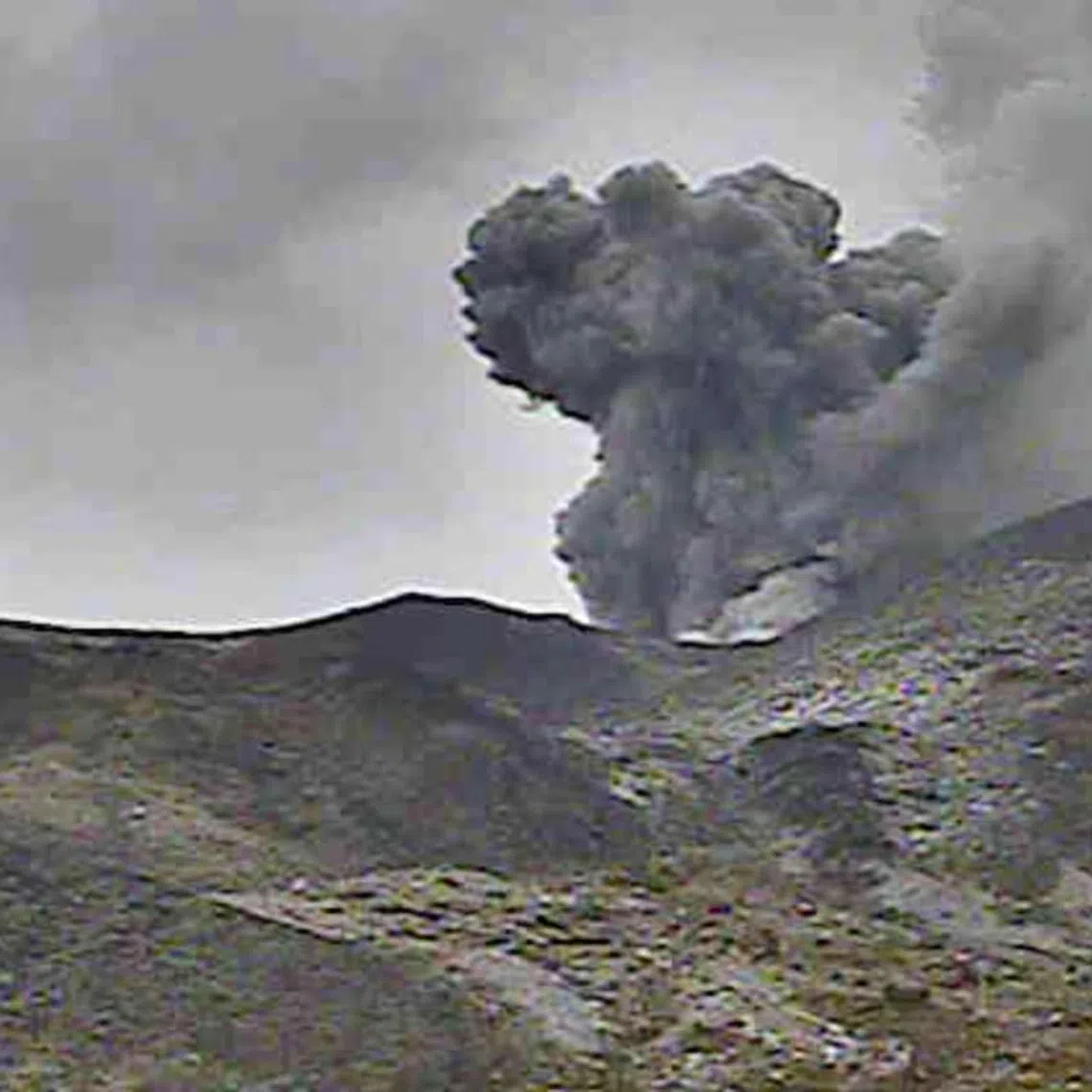 Mount Tokachi erupting on July 22. The weather authorities said large earthquakes near the volcano have increased since August.