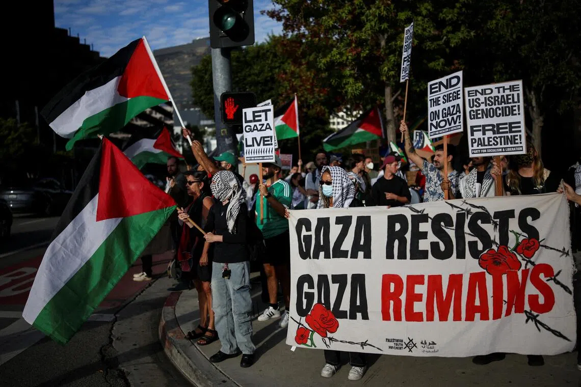Pro-Palestinian demonstrators protest outside the Consulate General of Israel in Los Angeles.
