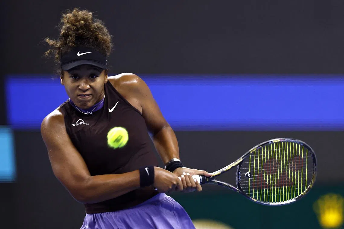 FILE PHOTO: Tennis - China Open - China National Tennis Center, Beijing, China - October 1, 2024 Japan's Naomi Osaka in action during her round of 16 match against Coco Gauff of the U.S. REUTERS/Tingshu Wang/File Photo