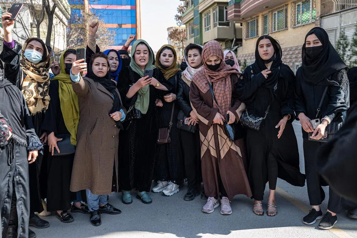 Afghan women stage a rare protest to mark International Women's Day in Kabul on March 8, 2023.