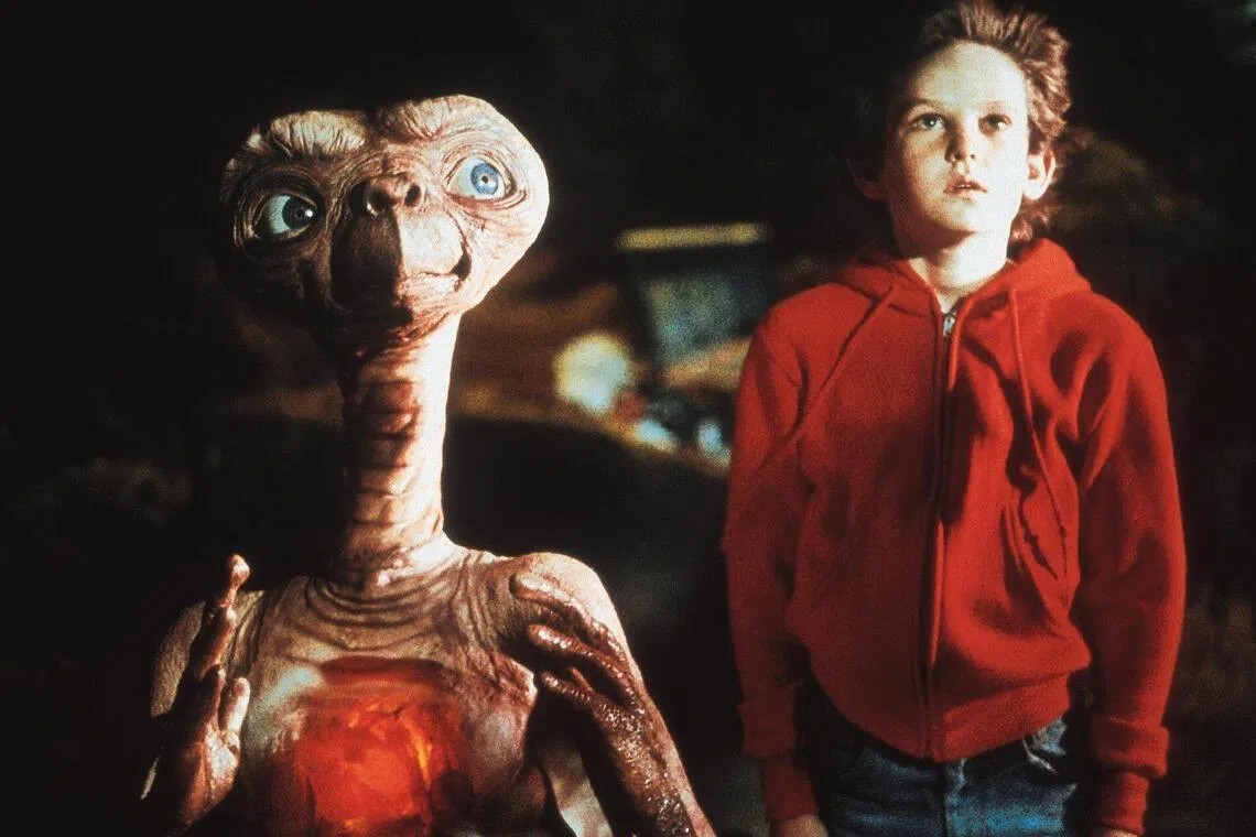 E.T. The Extra-Terrestrial (1982), starring Henry Thomas (right) as the boy who befriends an alien.