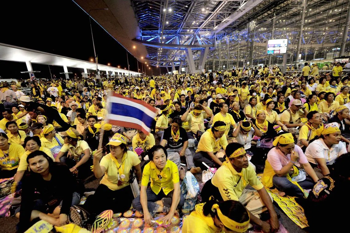 Anti-government protesters shouting slogans during a protest at Suvarnabhumi international airport in Bangkok on Nov 25, 2008. 