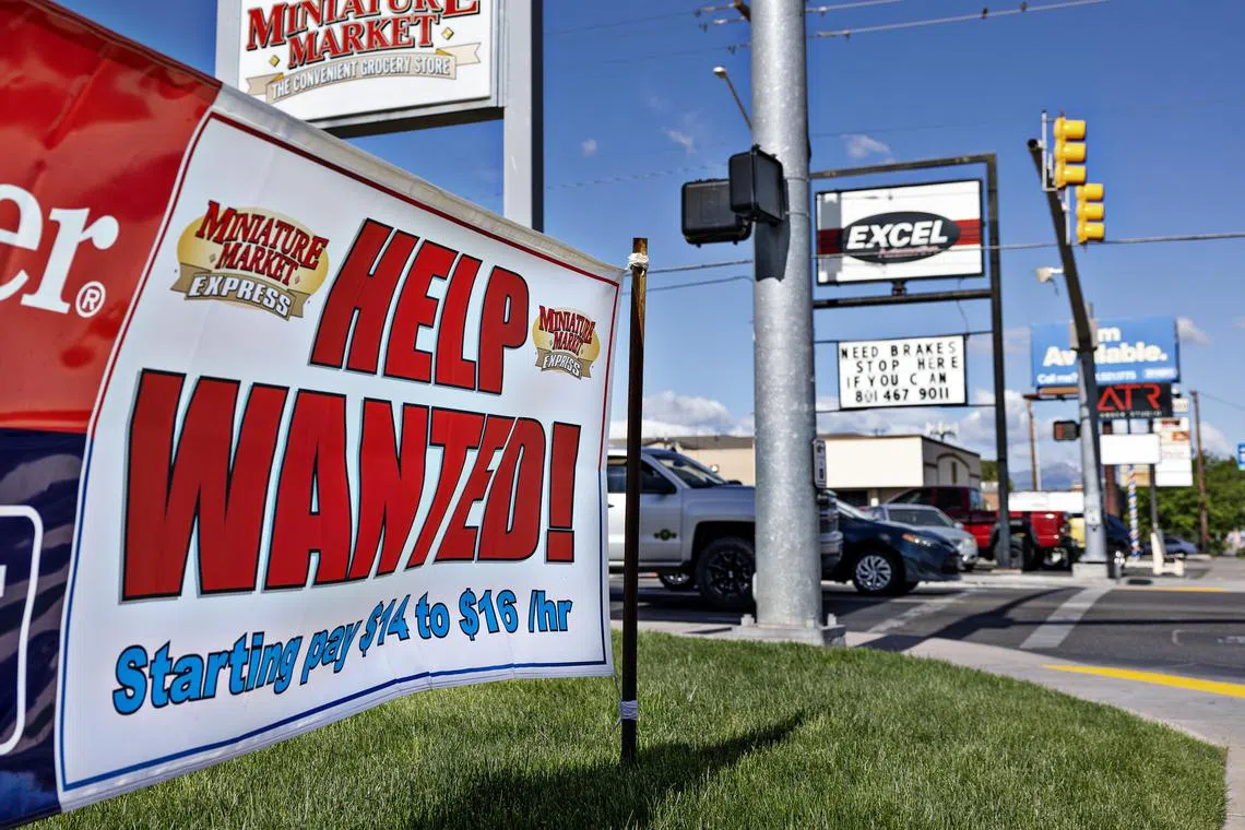 FILE Ñ A help wanted sign outside a gas station in Millcreek, Utah, June 4, 2024. The American job market significantly slowed in July, the Labor Department reported on Aug. 2, adding 114,000 jobs on a seasonally adjusted basis. (Kim Raff/The New York Times) 