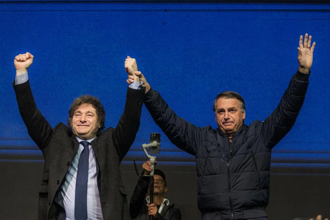Mr Javier Milei, Argentine's president (left) and Mr Jair Bolsonaro, Brazil's former president, during the CPAC Brazil pn July 7. 
