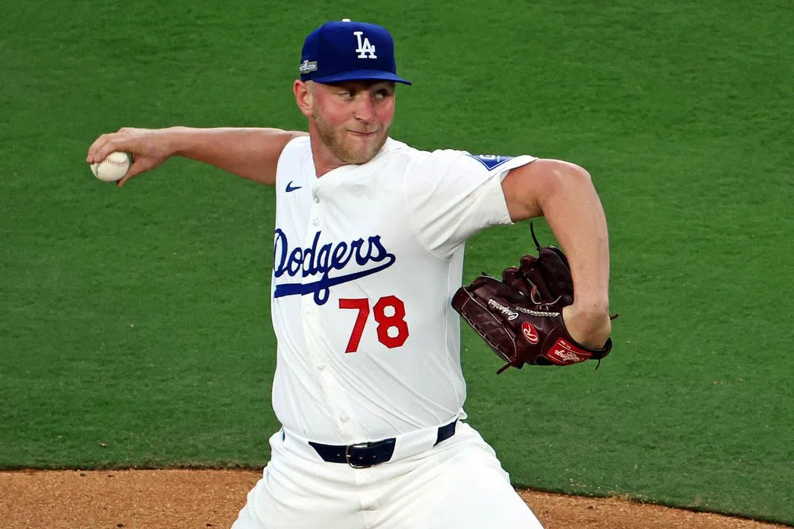FILE PHOTO: Oct 20, 2024; Los Angeles, California, USA; Los Angeles Dodgers pitcher Ben Casparius (78) pitches during the second inning against the New York Mets during game six of the NLCS for the 2024 MLB playoffs at Dodger Stadium. Mandatory Credit: Kiyoshi Mio-Imagn Images/File Photo