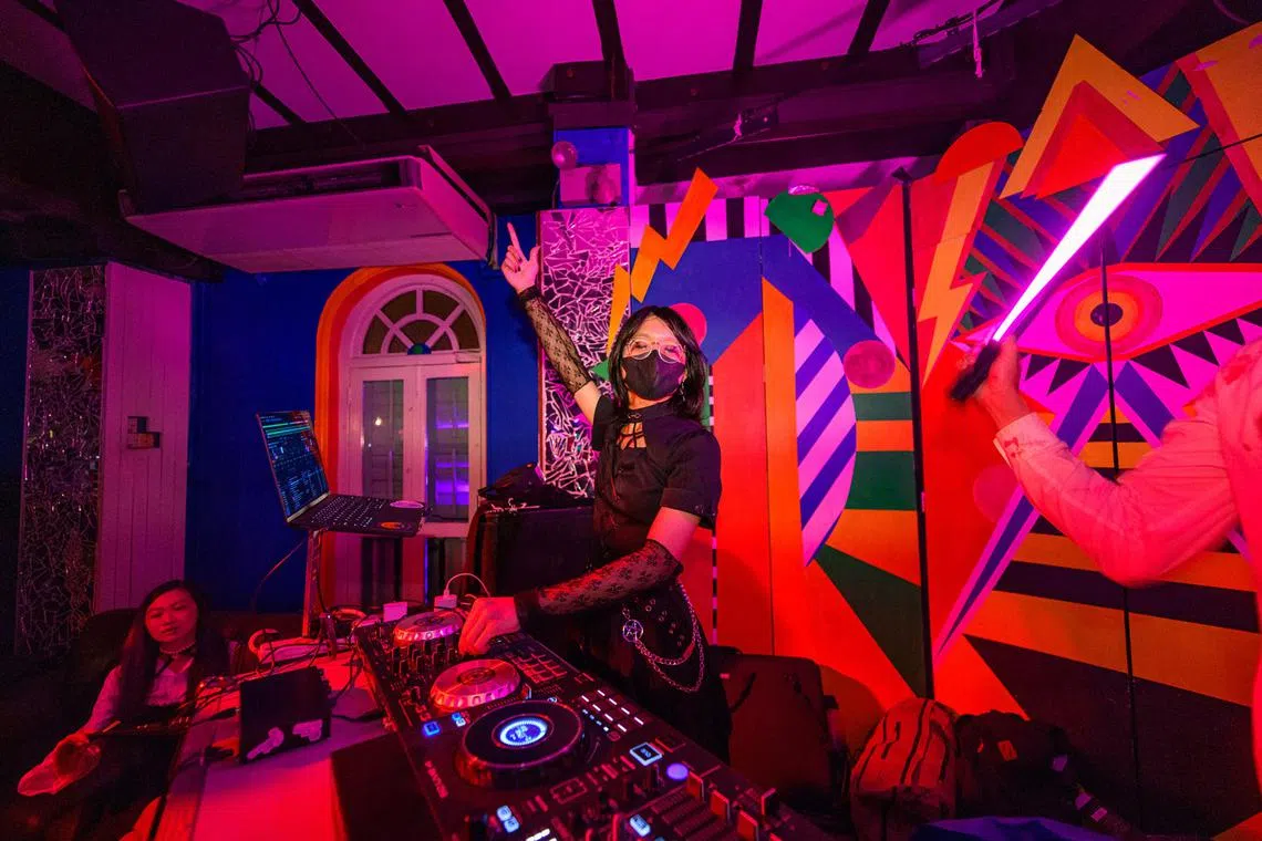 ffdja - Violet Yang, also known as DJ Vylt, spinning to dark alternative and horror genres.

PHOTO:  Brandon Koh