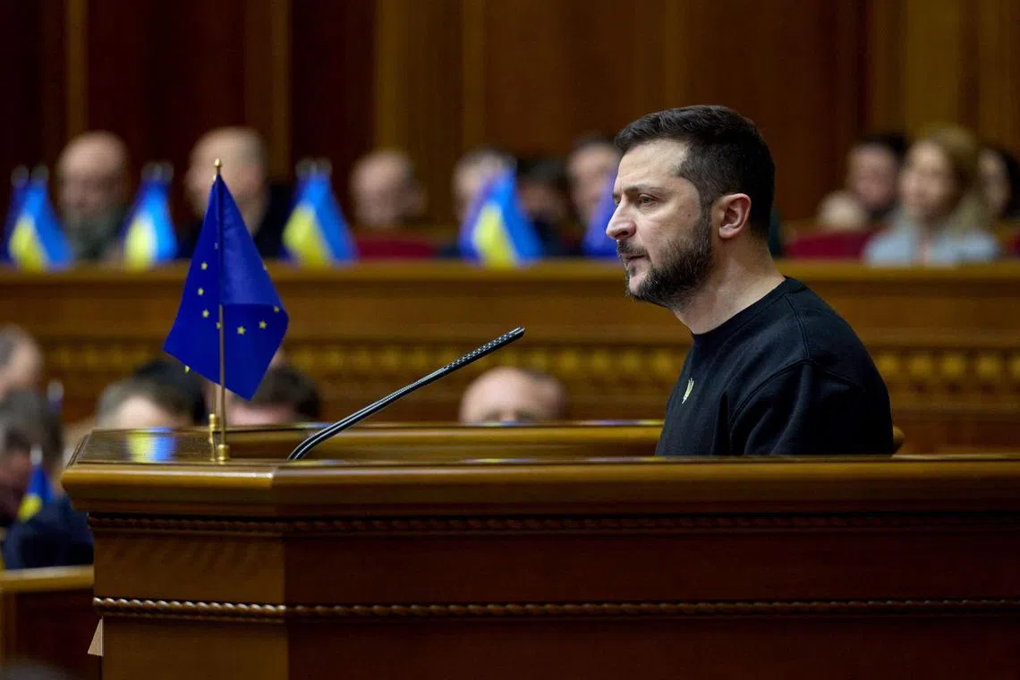 In this handout photograph taken and released by the Ukrainian Presidential Press Service on December 28, 2022 President Volodymyr Zelensky delivers his speech during the annual address to the Verkhovna Rada parliament in Kyiv. (Photo by Handout / UKRAINIAN PRESIDENTIAL PRESS SERVICE / AFP) / RESTRICTED TO EDITORIAL USE - MANDATORY CREDIT "AFP PHOTO / UKRANIAN PRESIDENTIAL PRESS SERVICE" - NO MARKETING NO ADVERTISING CAMPAIGNS - DISTRIBUTED AS A SERVICE TO CLIENTS -