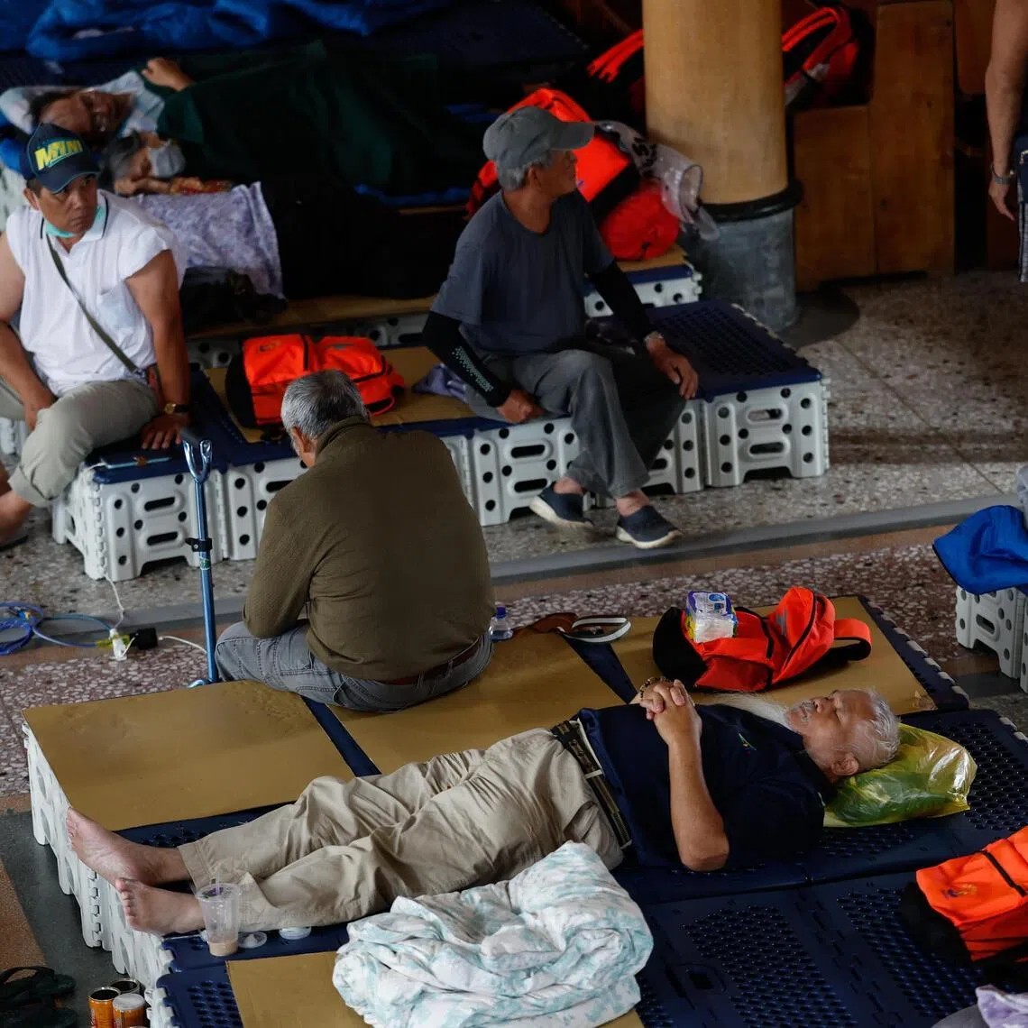 Residents at a church, turned into a temporary evacuation centre in preparation for Typhoon Bavi, in Taiwan’s Hualien county on July 10.