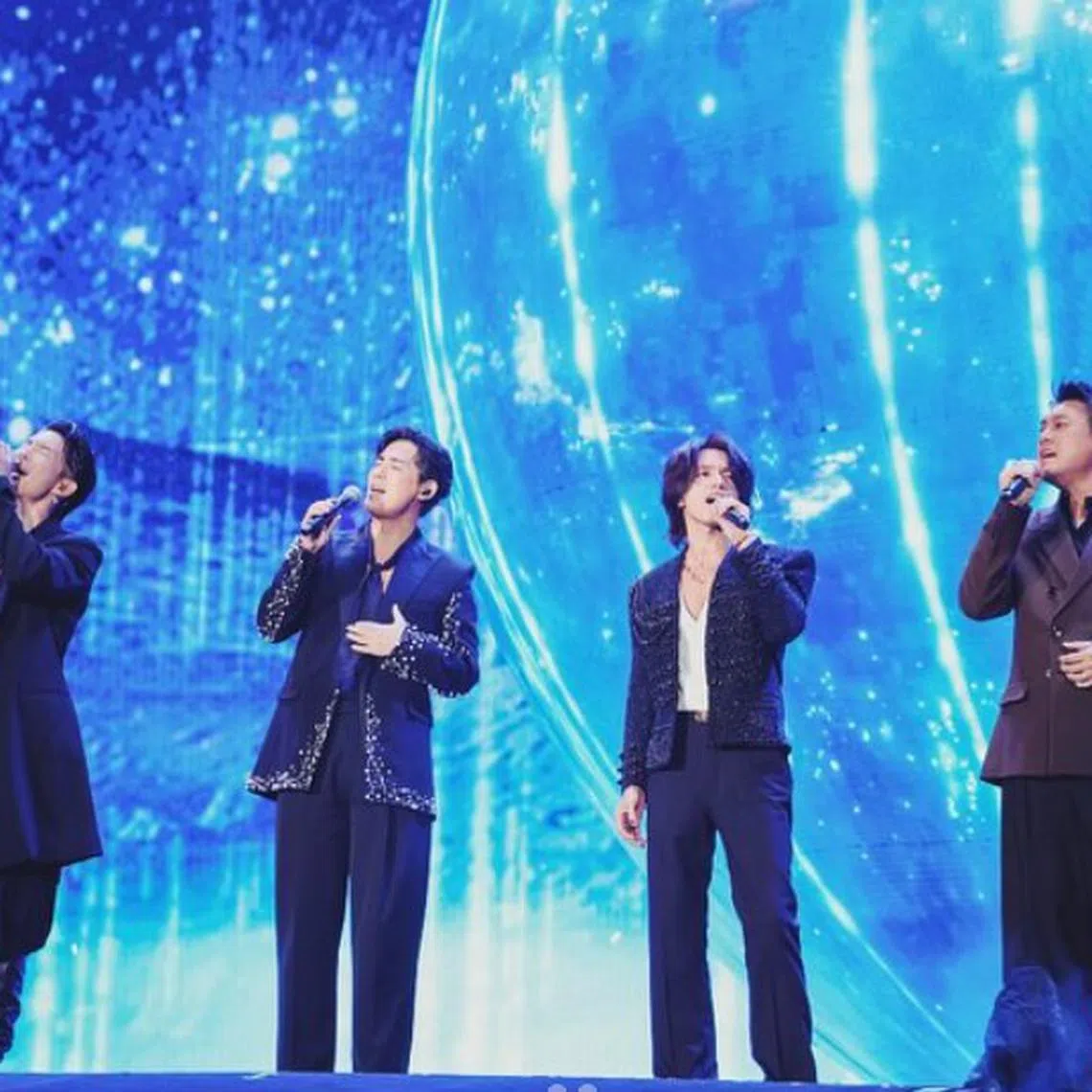 Taiwanese former boy band F4 reunites at Mayday's Taipei concert on July 12. 