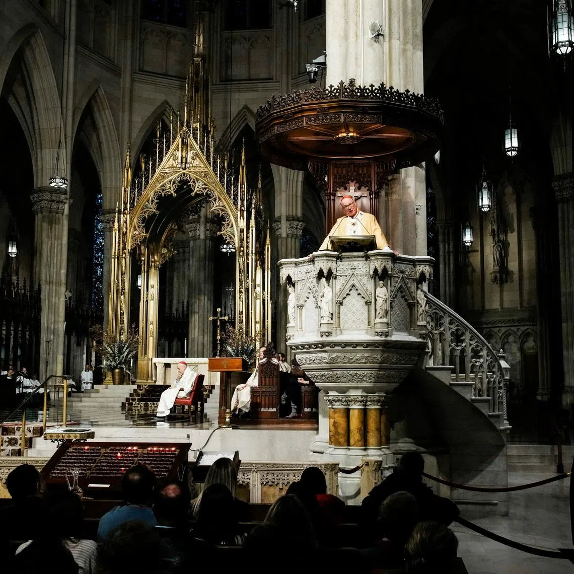 FILE PHOTO: New York Archbishop Timothy Dolan attends the mass before blessing food donations prepared by Catholic Charities for families in need ahead of Thanksgiving week, outside St. Patrick’s Cathedral in New York City, U.S., November 23, 2025. REUTERS/Eduardo Munoz./File Photo
