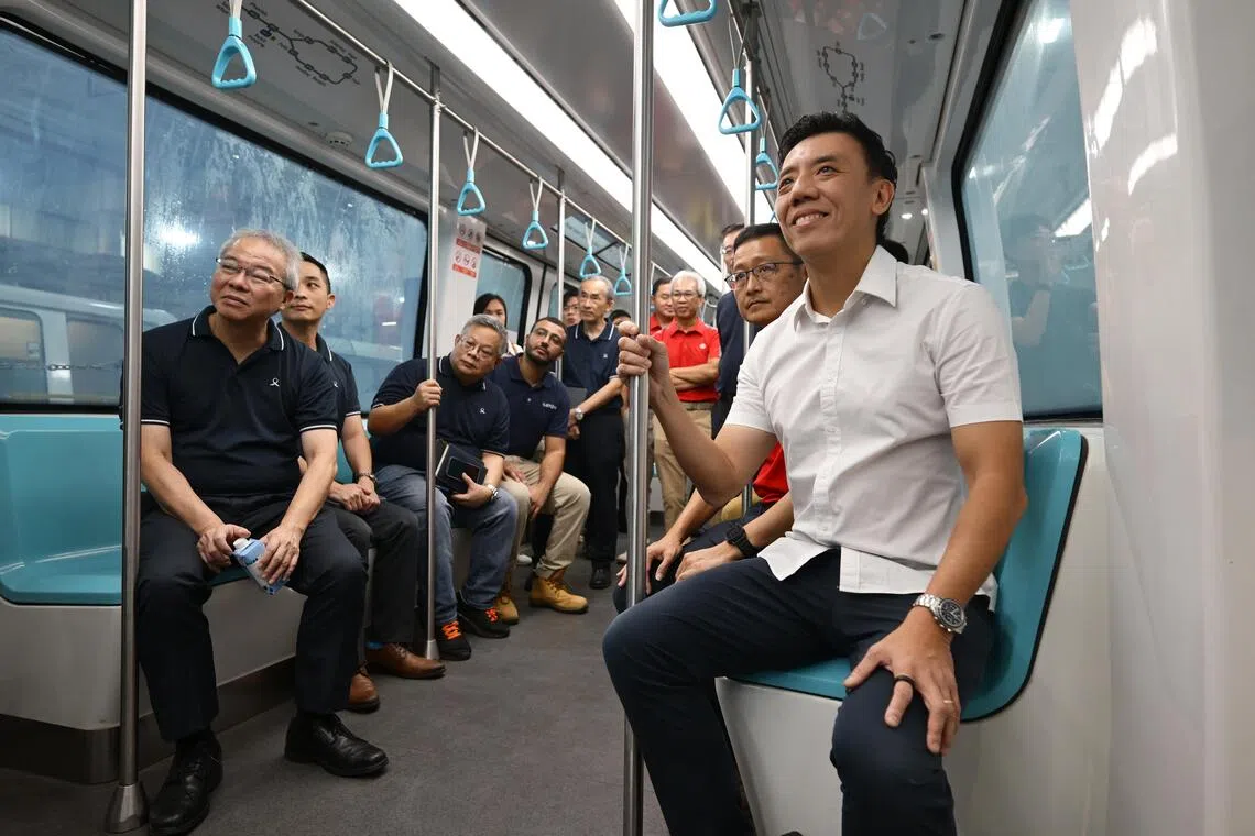 Transport Minister Jeffrey Siow (right) at the Ten Mile Junction depot on Oct 15.