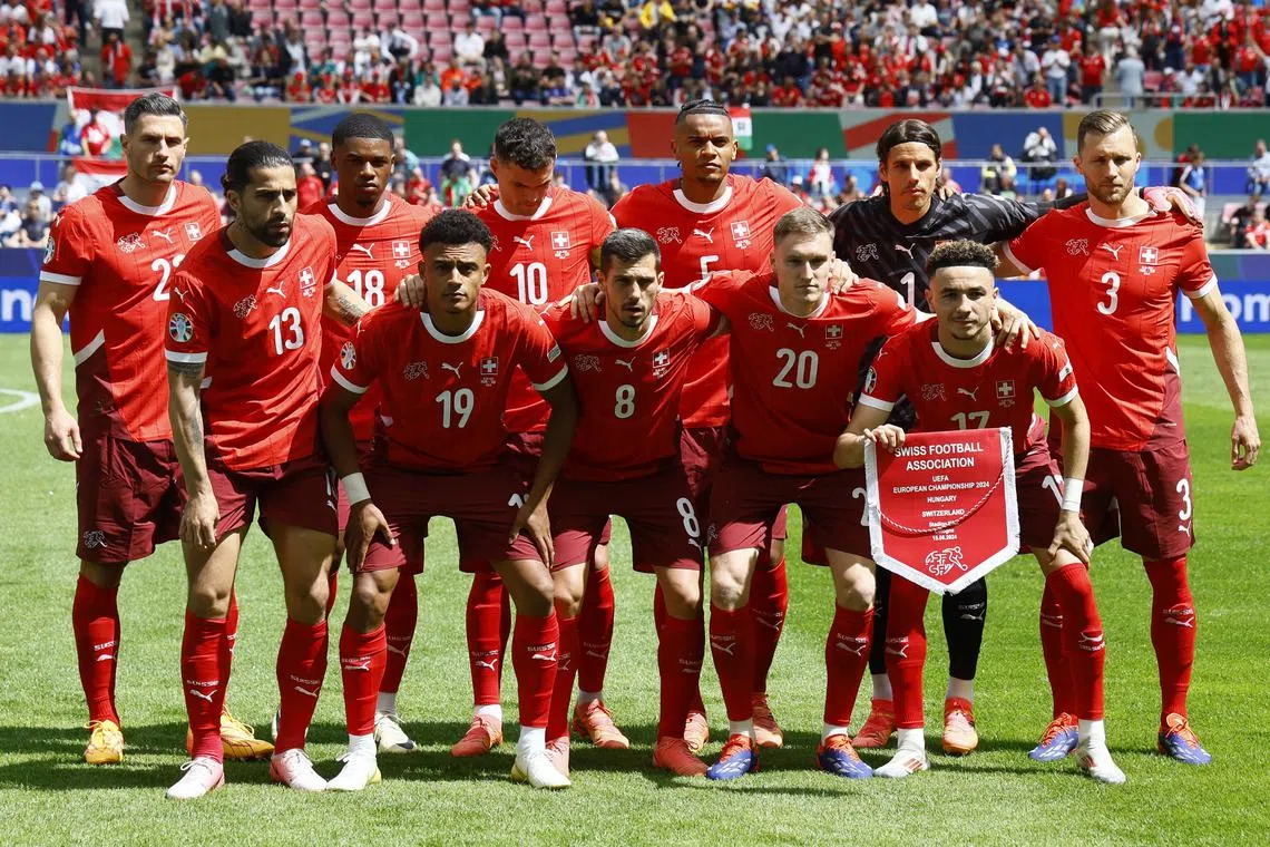 FILE PHOTO: Soccer Football - Euro 2024 - Group A - Hungary v Switzerland - Cologne Stadium, Cologne, Germany - June 15, 2024 Switzerland players pose for a team group photo before the match REUTERS/Wolfgang Rattay/File Photo