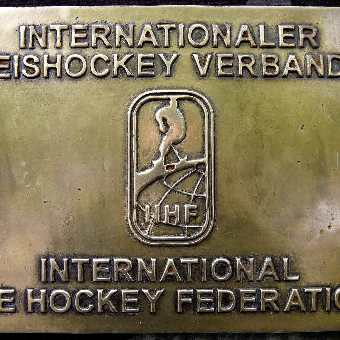 FILE PHOTO: The logo of the International Ice Hockey Federation (IIHF) is seen in front of its seat in Zurich, Switzerland April 26, 2016. REUTERS/Arnd Wiegmann/File Photo