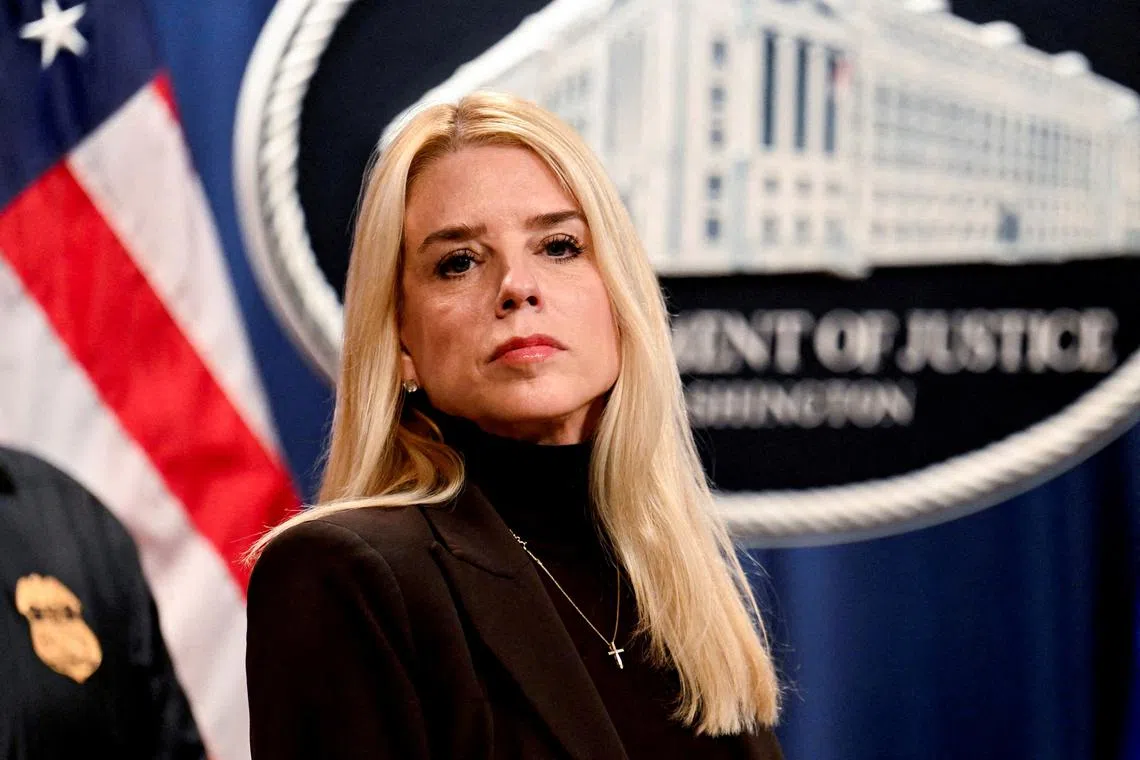 FILE PHOTO: U.S. Attorney General Pam Bondi looks on during her first press conference at the Justice Department in Washington, D.C., U.S., February 12, 2025. REUTERS/Craig Hudson/File Photo