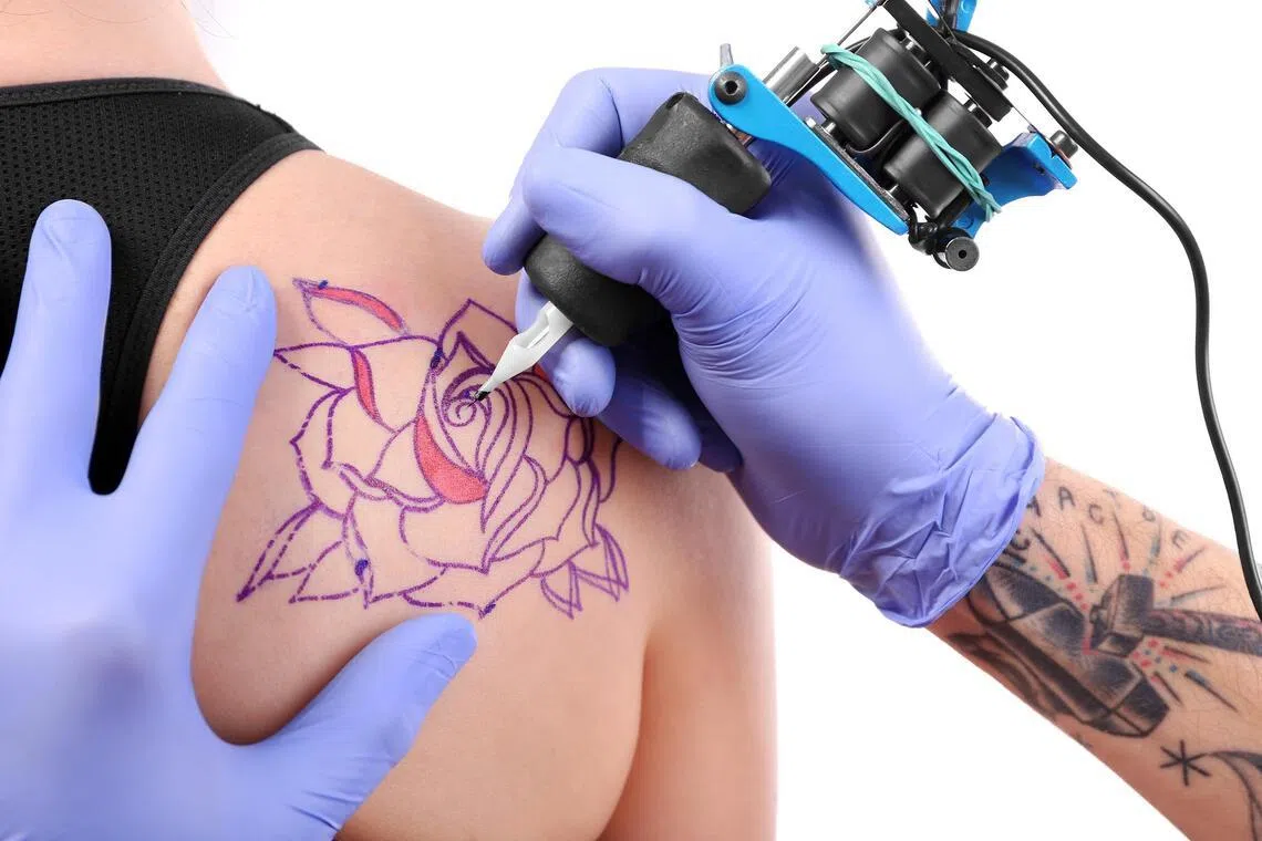 What are the health risks of getting a tattoo?