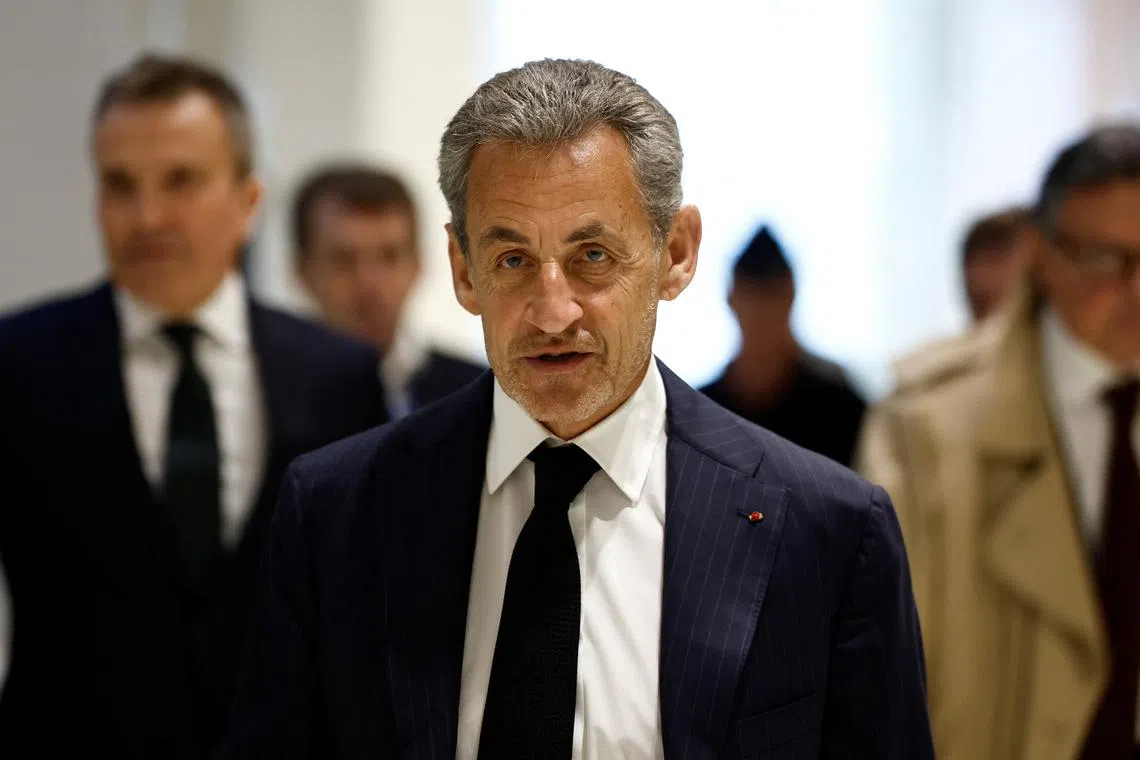 Former French President Nicolas Sarkozy arrives on the first day of his trial with twelve other defendants on charges of corruption and illegal financing of an election campaign related to alleged Libyan funding of his successful 2007 presidential bid, at the courthouse in Paris, France, January 6, 2025. REUTERS/Gonzalo Fuentes