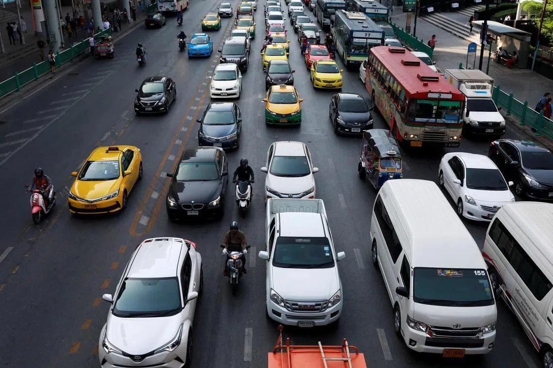 FILE PHOTO: Vehicles are seen in traffic along a road in Bangkok, Thailand December 18, 2018. REUTERS/Soe Zeya Tun/File Photo
