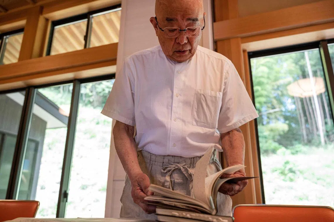Buddhist priest Eiichi Shinohara reads diaries of a woman who was swindled out of millions of yen.
