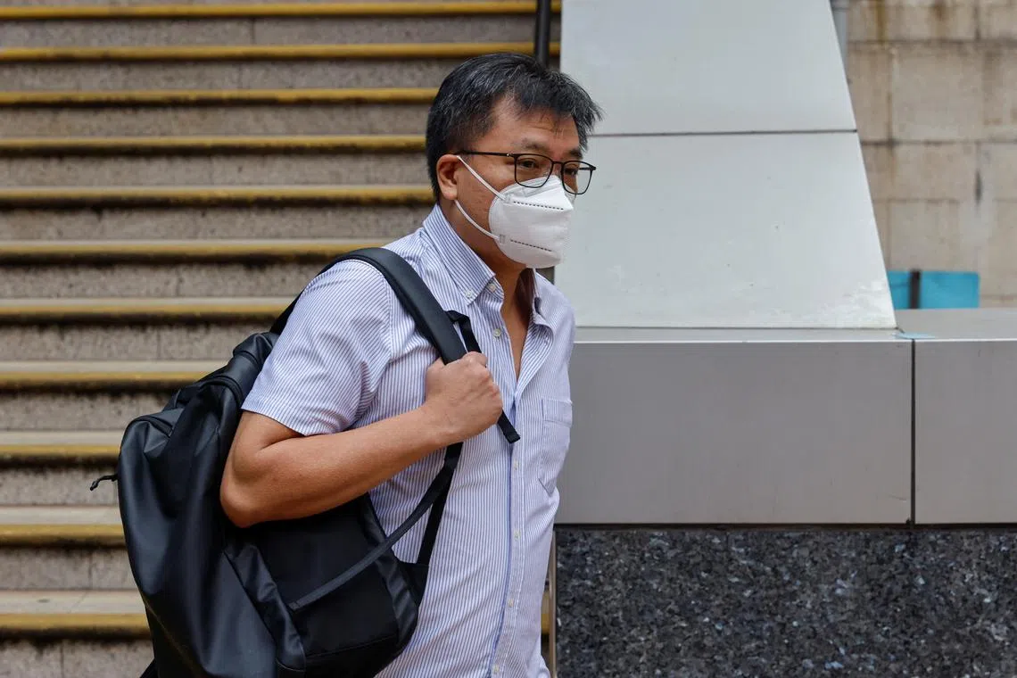 Mr Michael Kwok, elder brother of exiled activist Dennis Kwok, leaving a police station in Hong Kong on July 20.