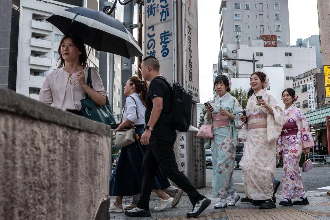 Japan retailers, tourism sector wary after China warns against travel