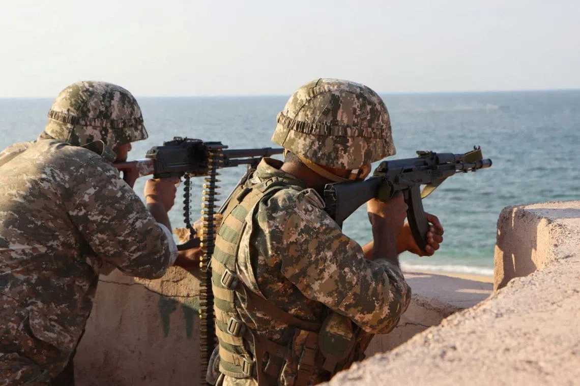 FILE PHOTO: Members of the Islamic Revolution Guards Corps (IRGC) navy participate in an exercise in the south of Iran, in this picture obtained on January 17, 2023. IRGC/WANA (West Asia News Agency)/Handout via REUTERS/File Photo