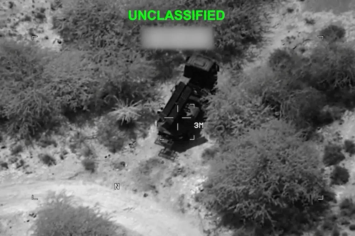 Military equipment targeted at an unknown location, during what the U.S. Central Command (CENTCOM) says are strikes on Iranian military targets, in this screengrab taken from a handout video released on July 23, 2026. U.S. Central Command/Handout via REUTERS