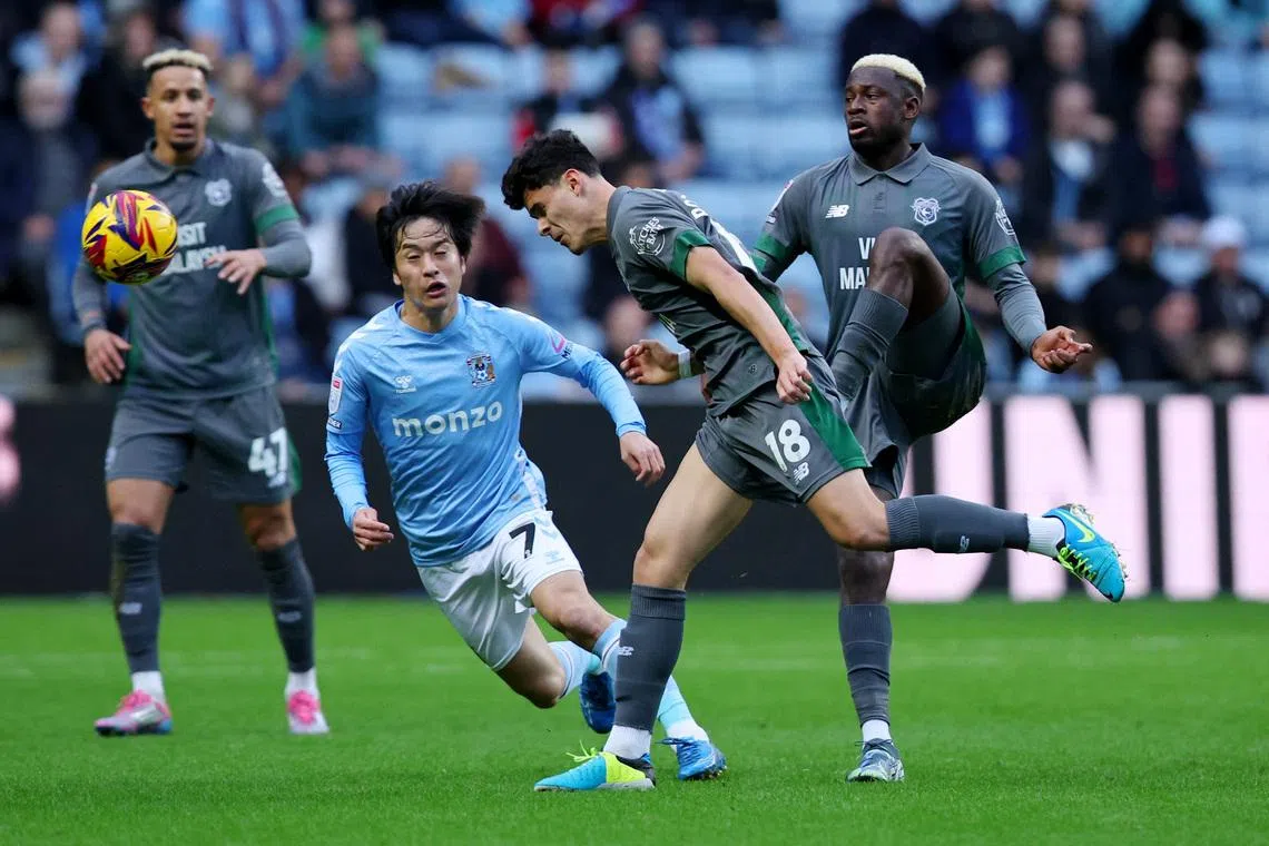 FILE PHOTO: Soccer Football - Championship - Coventry City v Cardiff City - Coventry Building Society Arena, Coventry, Britain - November 30, 2024 Coventry City's Tatsuhiro Sakamoto in action with Cardiff City's Alex Robertson Action Images/Craig Brough