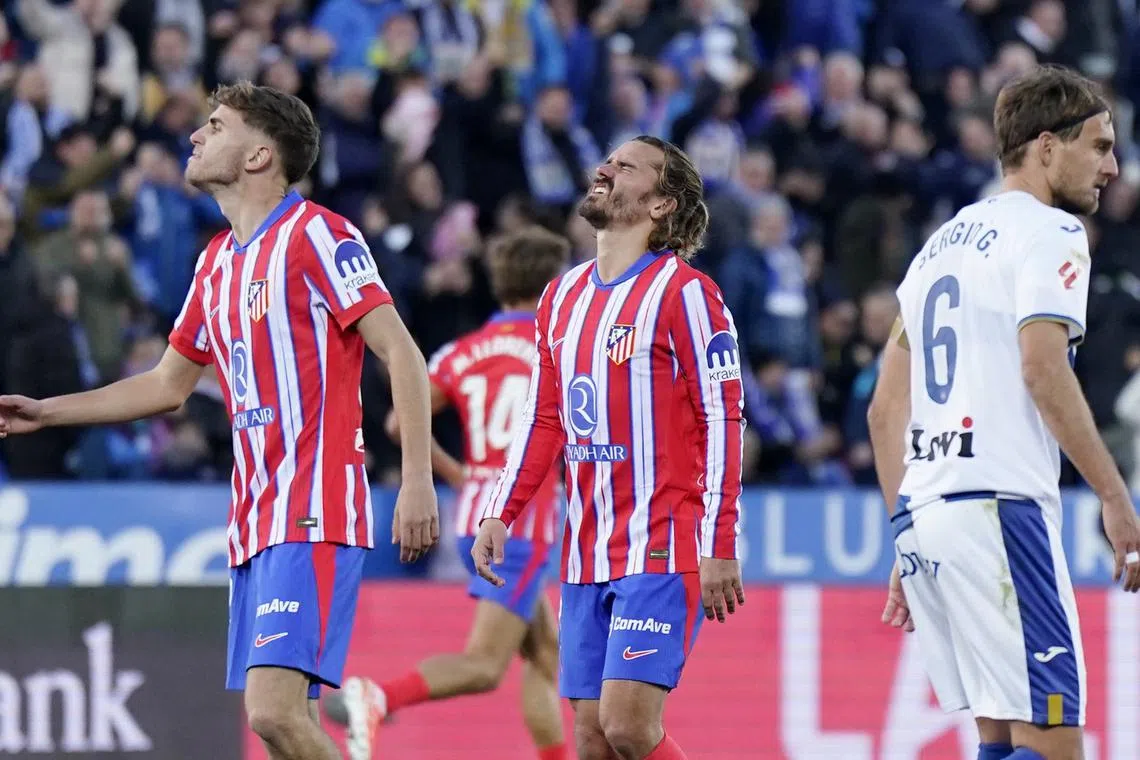 Soccer Football - LaLiga - Leganes v Atletico Madrid - Estadio Municipal de Butarque, Leganes, Spain - January 18, 2025 Atletico Madrid's Antoine Griezmann reacts after missing a penalty kick REUTERS/Ana Beltran